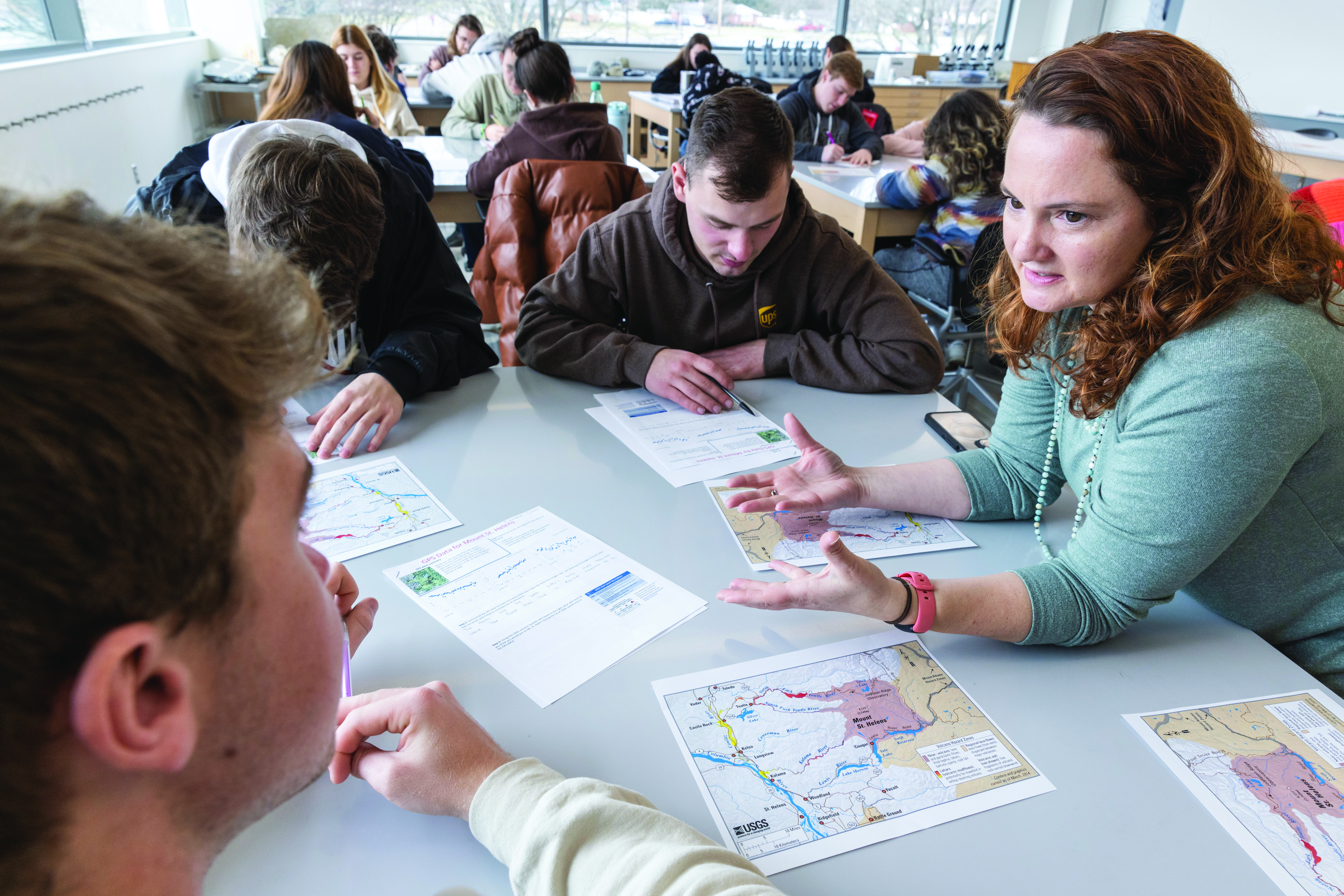 (Left to Right) Cameron Casto, Eric Lovelace, Ricky Collins, Jill S. Leonard-Pingel. Earth Science 1200 in room 205 Alford Center on the Newark campus. Professor Jill S. Leonard-Pingel, PhD (Green shirt /red long hair) Learning Spaces OSAM Spring 23