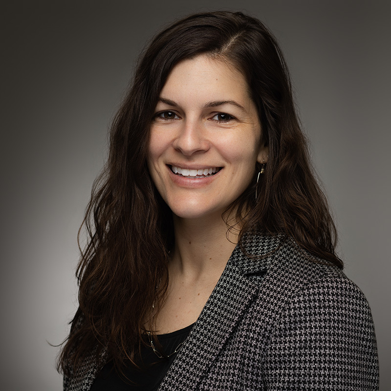 Alyssa Bedrosian in a black shirt and checkered blazer