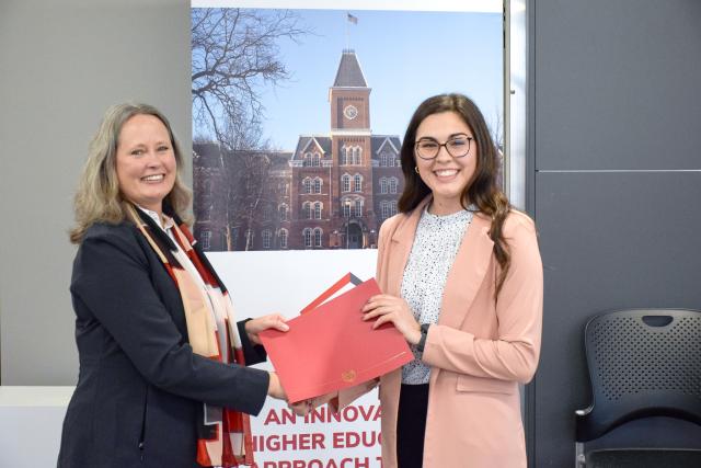 Mary Stromberger (l), vice provost for graduate education and dean of the Graduate School, is pictured with 3MT first and peoples choice winner Mora Boatman.