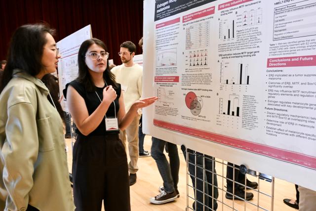 MCDB graduate student Jocelyn Treneff presenting research on estrogen receptors impact on melanoma