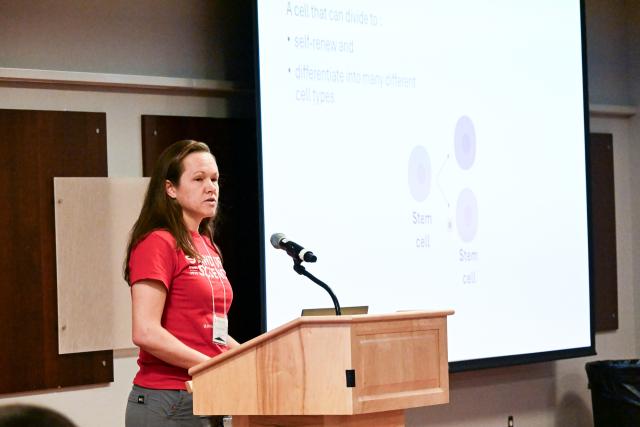 Elizabeth Kirby, Associate Professor, Behavioral Neuroscience presenting in front of a crowd