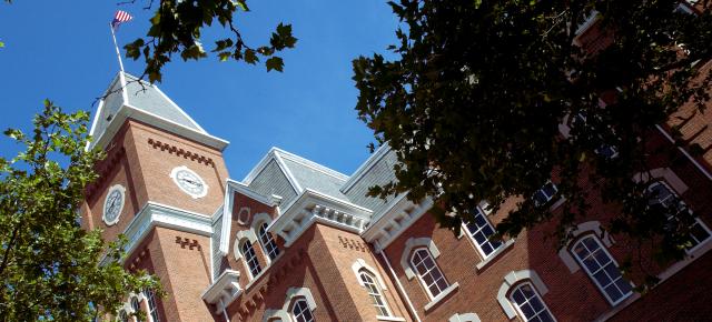 University Hall with Trees and Blue Sky