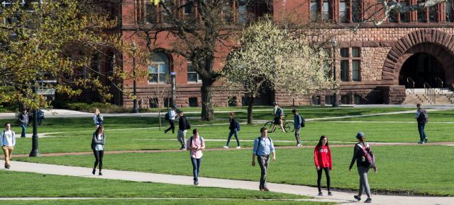 Students walking on the oval infront of Hayes Hall