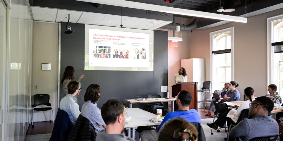 Facilitators presenting at workshop with faculty