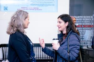 A graduate student speaking to Dean Mary Stromberger at the Donuts with the Deans Graduate Professional Student Appreciation Week Event