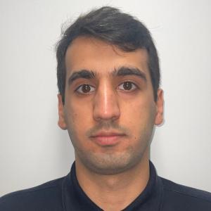 A photo of Kazem Dogaheh wearing a black shirt.