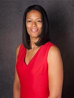 La’Tonia Stiner-Jones, PhD, MBA in red dress