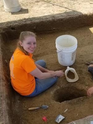 Samantha Kirgesner on site at a dig 